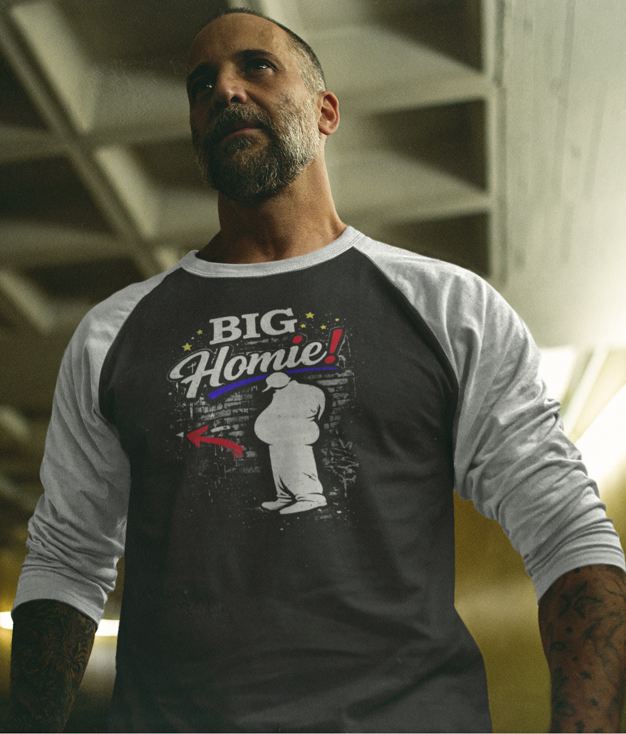 Man wearing a black and white long-sleeve shirt with 'BIG Homie' graphic design.