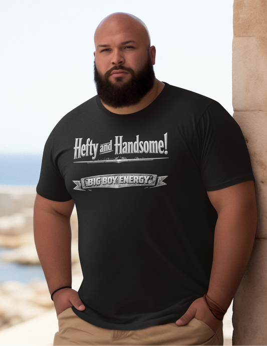 Man wearing a black t-shirt with text standing by a stone wall near water