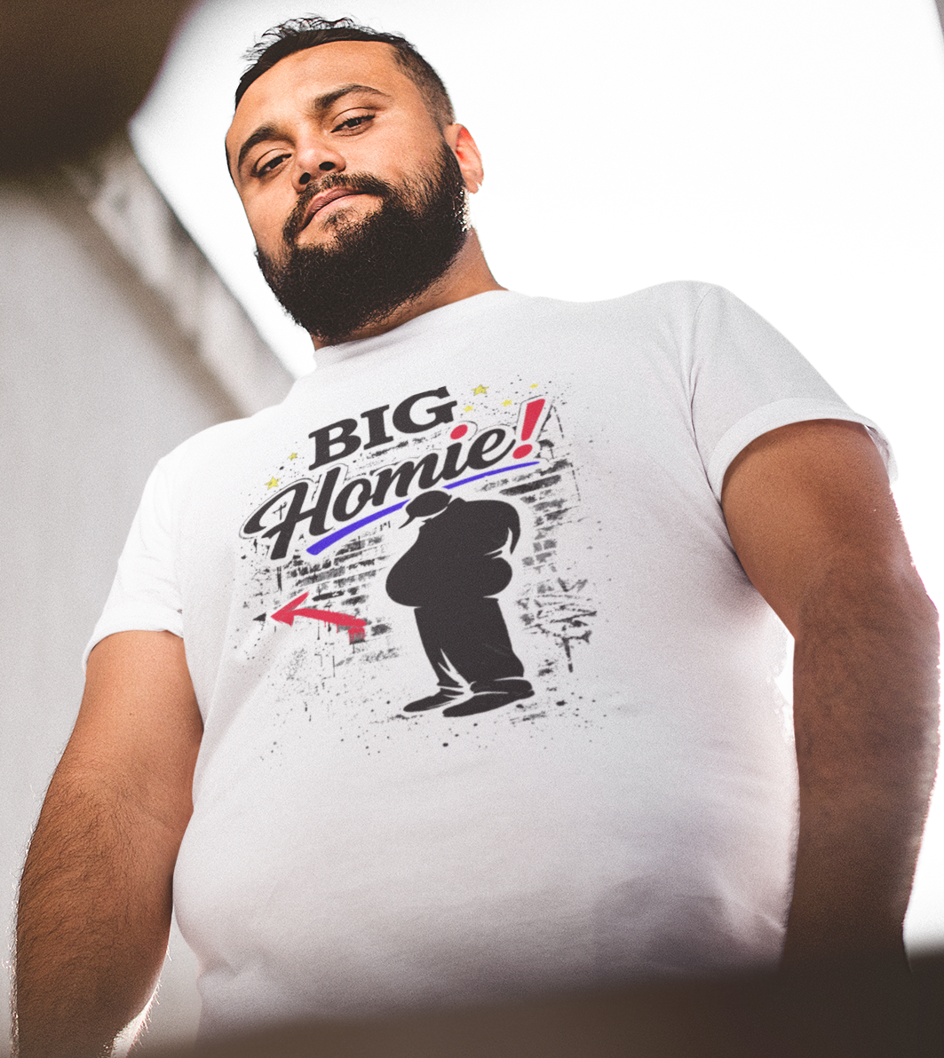 Man wearing a white t-shirt with colorful graphics and text.