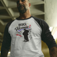 Man wearing a white and black baseball shirt with 'BIG Homie!' graphic design.