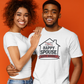 Two people wearing white t-shirts with a house graphic and text on an orange background